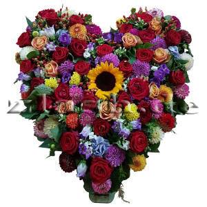Buntes Blumenherz mit Sonnenblume